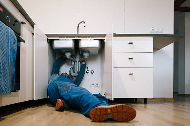 Professional Drain Cleaning technician working in Mc Donald, TN